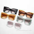 Tendencia de la moda europea y americana Gafas de sol de ojo de gato con montura grande Gafas de sol RETRO de color que cambian gradualmente para mujer sam